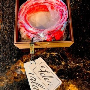 Red belt with silver buckle accents- never worn!